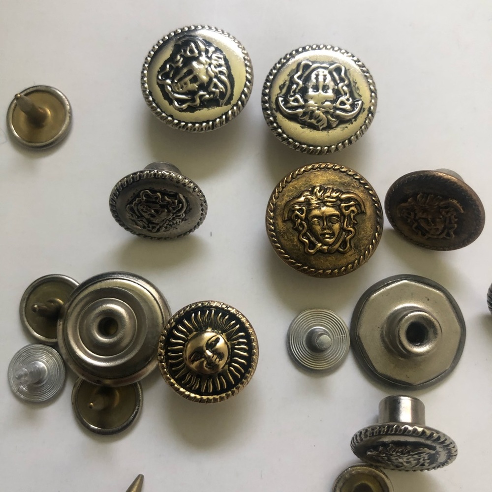 Assorted Versace Jeans Couture rivers for jeans